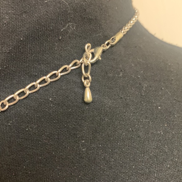 Necklace with a silver chain and white and silver accent piece - Picture 9 of 9